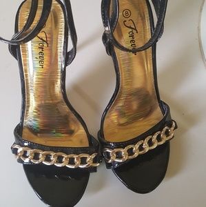 Elegant black and gold heels